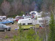 Fishermen park their campers in the one spot that still has a few trees. 